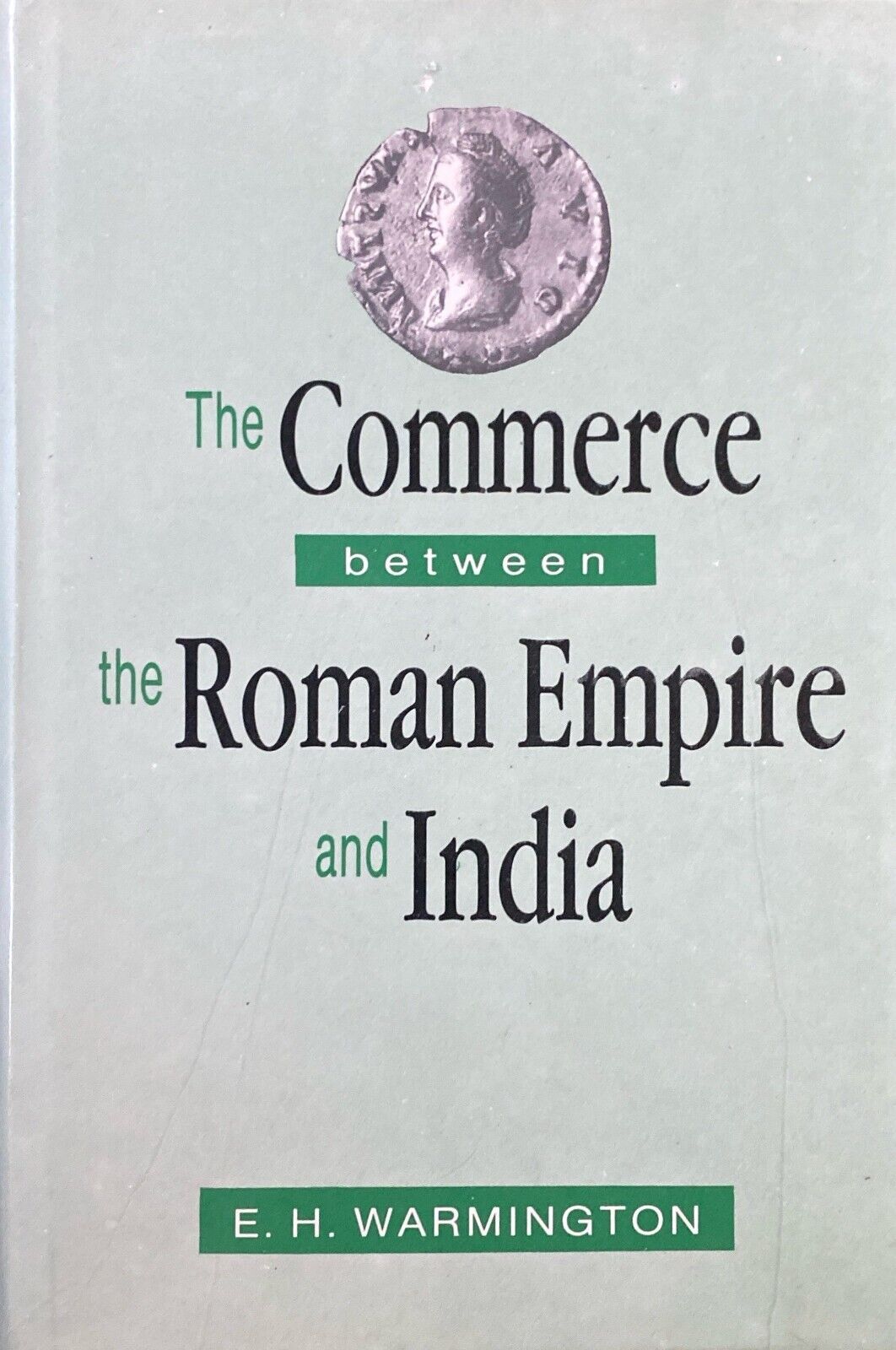 The Commerce Between the Roman Empire and India by E.H. Warmington Hardcover
