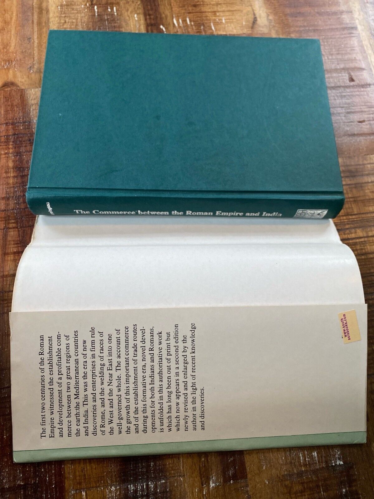 The Commerce Between the Roman Empire and India by E.H. Warmington Hardcover