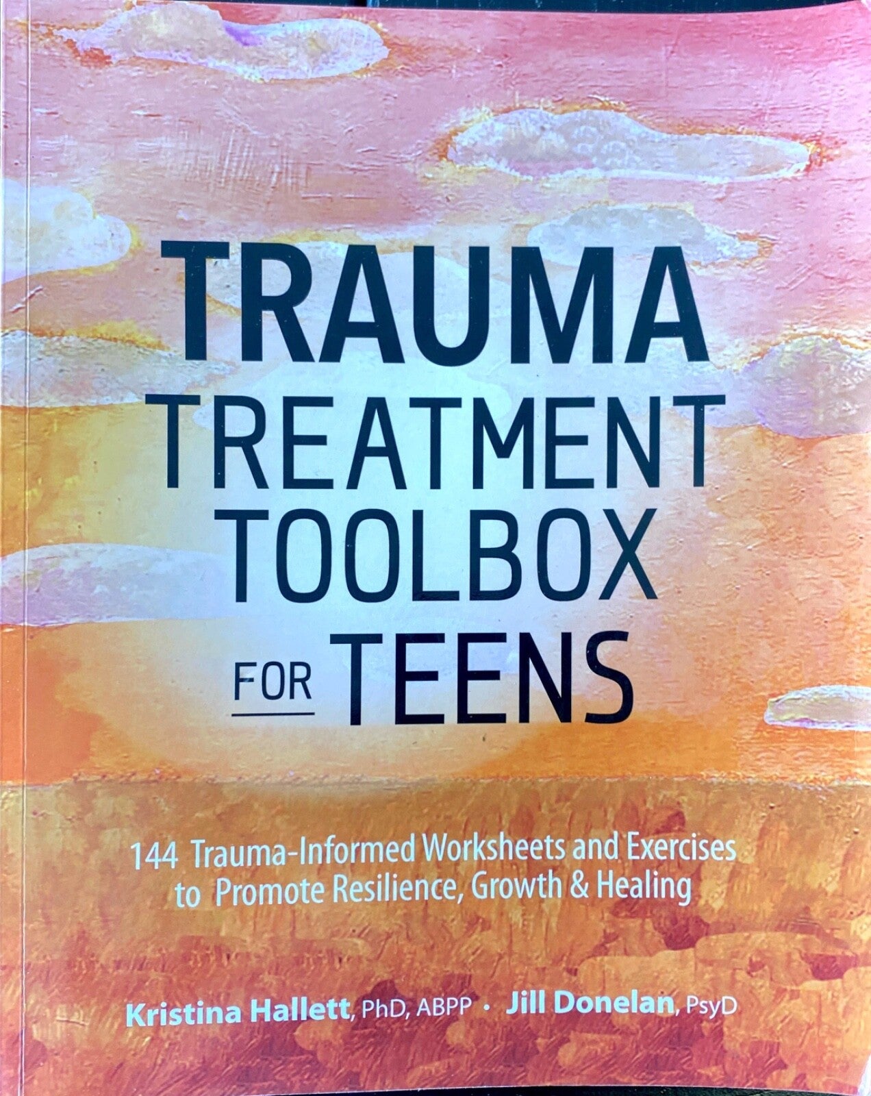 Trauma Treatment Toolbox for Teens by Kristina Hallett and Jill Donavan